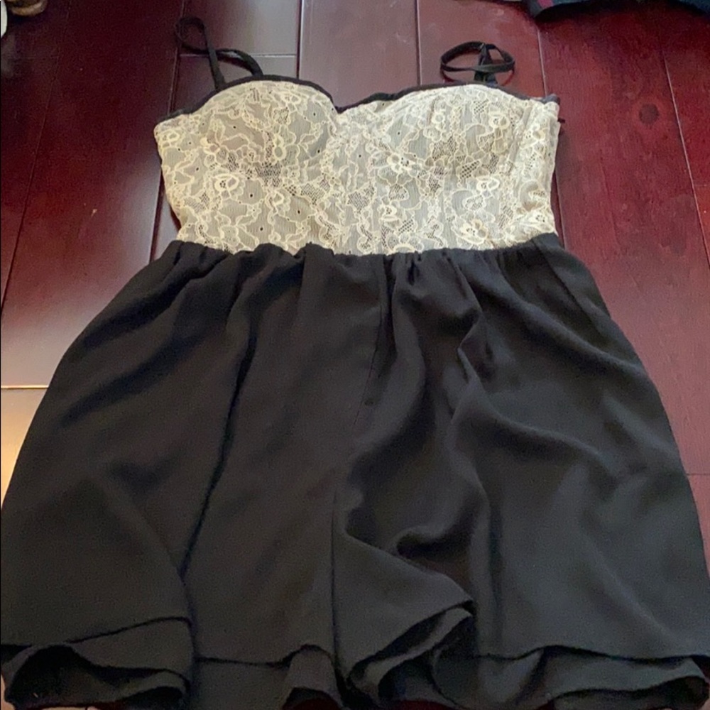 Black romper with lace. Removable straps
